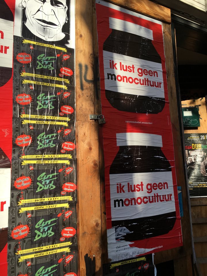 Posters in Amsterdam saying "I don’t want monoculture." Protestors have criticized the "commmercialization" of the city