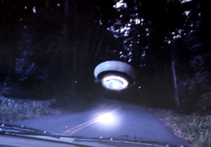 1605506460 UNITED STATES a woman photographs a UFO on an isolated